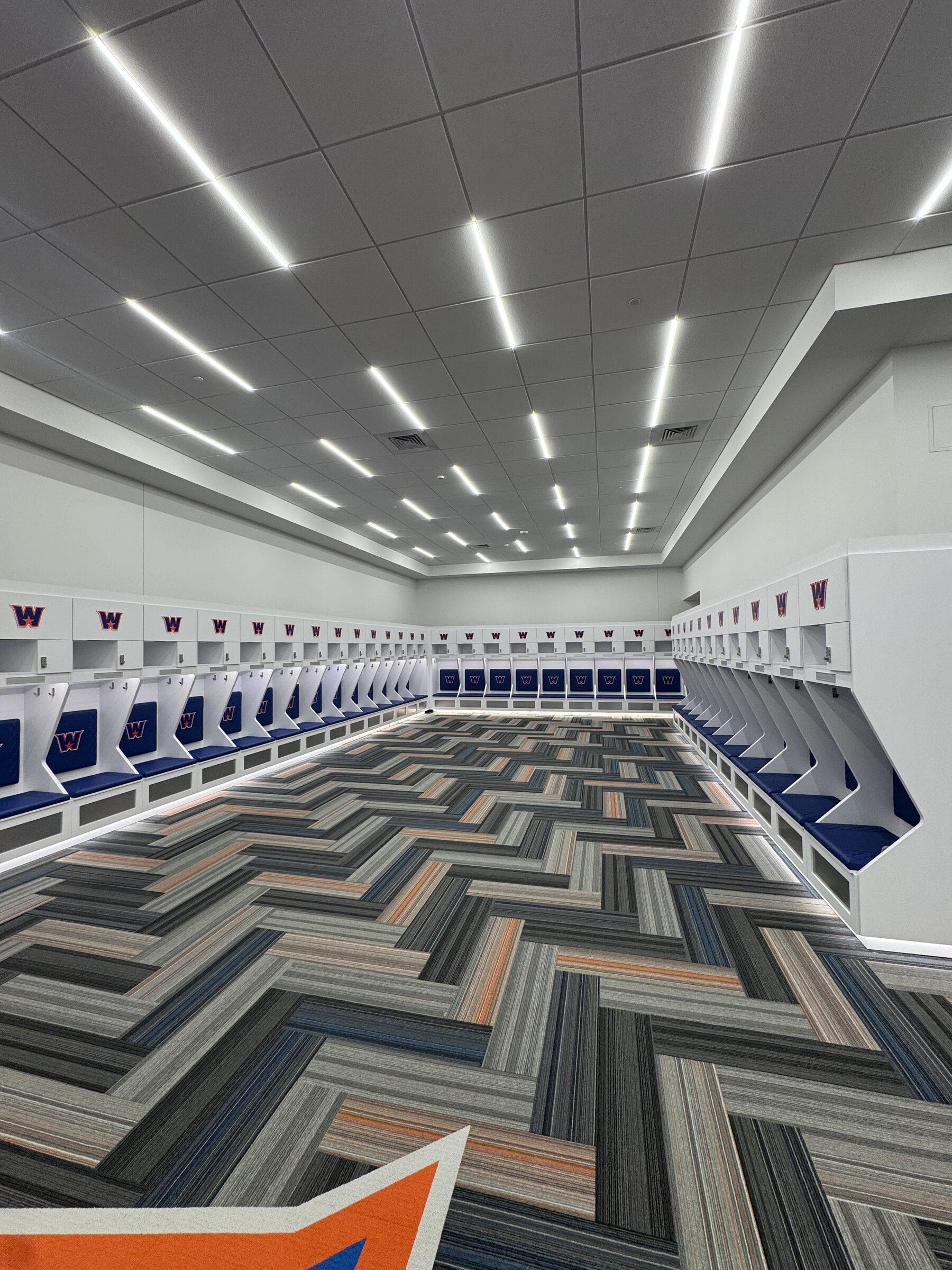 Stadium-style locker room rows detailed before a season opener
