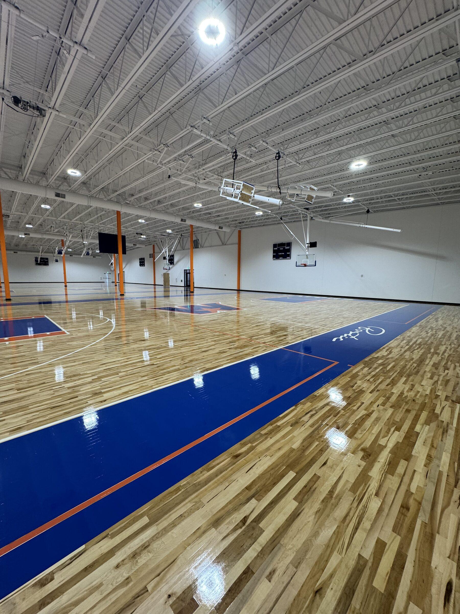 Glossy basketball courts at a sports academy we maintain